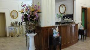 Kuchyň nebo kuchyňský kout v ubytování Hotel Flowers