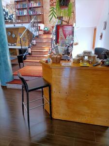 a counter with a chair next to a staircase at La Casona Canaria Boutique Home B & B in Agüimes