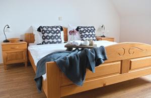Letto o letti in una camera di Weingut Winzerzimmer Rothschädl