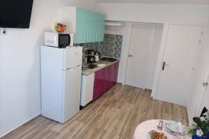 A kitchen or kitchenette at Apartamento 5 minutos hasta la playa