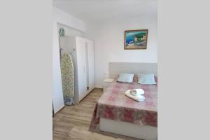 A bed or beds in a room at Apartamento 5 minutos hasta la playa