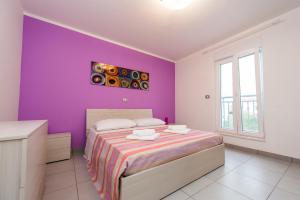 Postel nebo postele na pokoji v ubytování Blue Sky Apartments