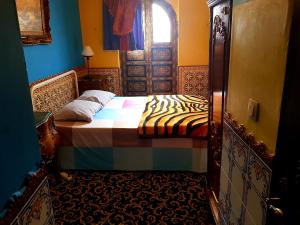 Postel nebo postele na pokoji v ubytování Hotel Mozart