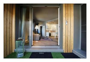 A bed or beds in a room at Il Rifugio del Risol