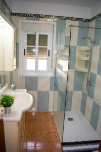 a bathroom with a sink and a shower at Tamaide Paradise C in Costa Del Silencio