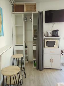 Kuchyň nebo kuchyňský kout v ubytování Studio du Commandant Marché