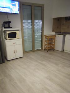 Kuchyň nebo kuchyňský kout v ubytování Studio du Commandant Marché