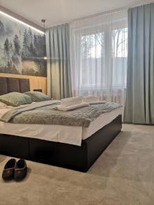 Posteľ alebo postele v izbe v ubytovaní Apartament Liliowa Przełęcz
