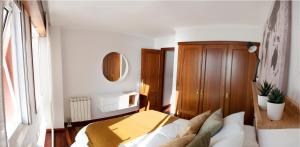 En eller flere senge i et værelse på Apartamento Paseo Marítimo