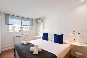 Posteľ alebo postele v izbe v ubytovaní Sitges Group Beach Dreams