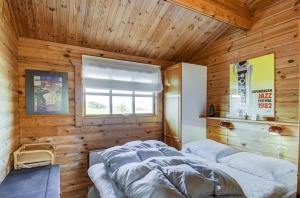 Postel nebo postele na pokoji v ubytování Cozy house with stunning sea views