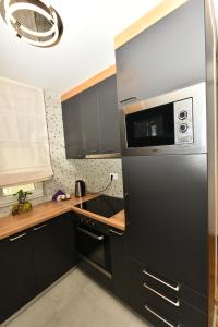 Nhà bếp/bếp nhỏ tại Grand Lux apartman