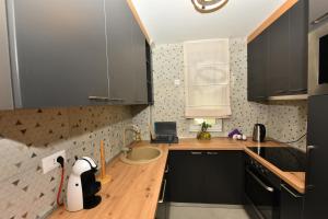 Nhà bếp/bếp nhỏ tại Grand Lux apartman