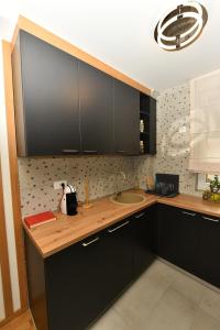 Nhà bếp/bếp nhỏ tại Grand Lux apartman