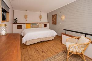 A bed or beds in a room at Cala Melí
