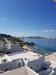 a view of the ocean from the roof of a building at 4BD Blue Dream Mykonos in Mikonos
