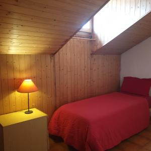 
A bed or beds in a room at Casa Jolanda
