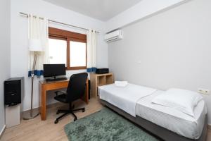 Postel nebo postele na pokoji v ubytování Ritas Modern In-City House