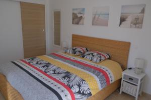 Кровать или кровати в номере Petite Maison refaite à neuf proche plage