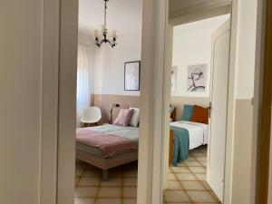 Posteľ alebo postele v izbe v ubytovaní A&B Homes Leuca