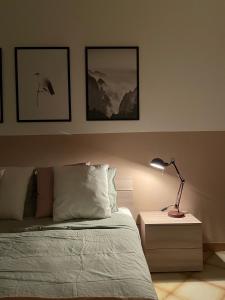 Posteľ alebo postele v izbe v ubytovaní A&B Homes Leuca