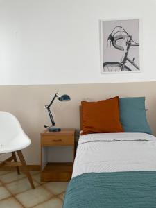Posteľ alebo postele v izbe v ubytovaní A&B Homes Leuca