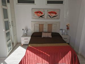 Posteľ alebo postele v izbe v ubytovaní APARTAMENTO GALTOR 6