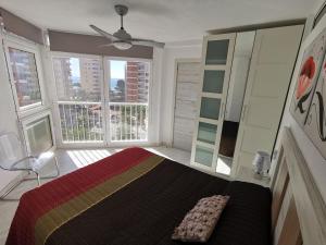 Posteľ alebo postele v izbe v ubytovaní APARTAMENTO GALTOR 6