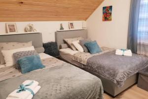 Postel nebo postele na pokoji v ubytování Villa Lady Di Plitvice + 37 fotografií