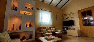 TV a/nebo společenská místnost v ubytování Apartment Molnar