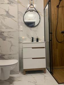 Kúpeľňa v ubytovaní Apartament Fordon przy Onkologii + 3 fotografie