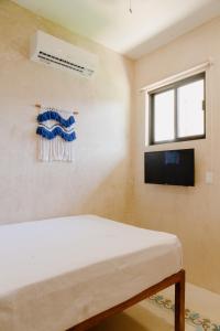 TV a/nebo společenská místnost v ubytování Hostik Hostal