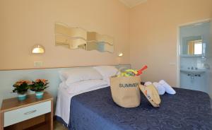 Postel nebo postele na pokoji v ubytování Hotel Oltremar B&B