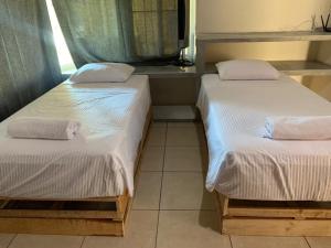 Postel nebo postele na pokoji v ubytování CASA con alberca, súper ubicación. Puerto de Veracruz