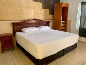Postel nebo postele na pokoji v ubytování CASA con alberca, súper ubicación. Puerto de Veracruz