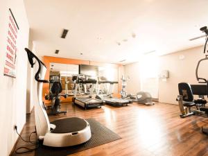 a room with a gym with exercise equipment in it at Mercure Ostrava Center in Ostrava