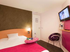 Posteľ alebo postele v izbe v ubytovaní ibis Styles Bourg en Bresse