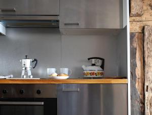 A kitchen or kitchenette at Chalet Swiss Andermatt
