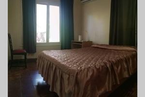 Postel nebo postele na pokoji v ubytování Casa amplia y céntrica para 2-6 personas. Cochera.