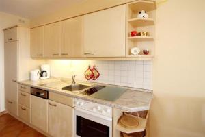 Haus-Meeresblick-Wohnung-2-11-322にあるキッチンまたは簡易キッチン