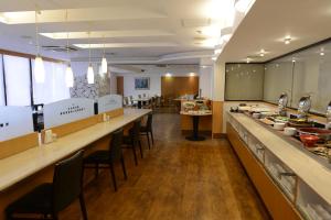 Restavracija oz. druge možnosti za prehrano v nastanitvi APA Hotel Muroran