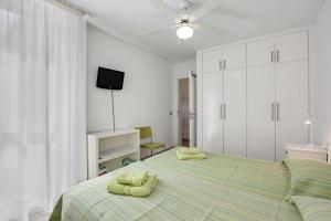 Ένα ή περισσότερα κρεβάτια σε δωμάτιο στο Casa Médano 18