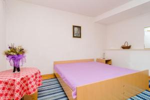 Postel nebo postele na pokoji v ubytování Apartments Rašica Molunat