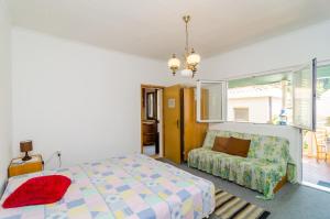 Postel nebo postele na pokoji v ubytování Apartments Rašica Molunat