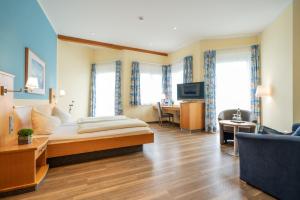TV a/nebo společenská místnost v ubytování Hotel-Gasthaus Adler