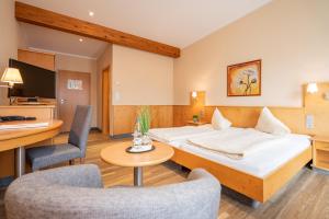Postel nebo postele na pokoji v ubytování Hotel-Gasthaus Adler