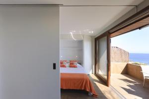 Posteľ alebo postele v izbe v ubytovaní Lets Holidays Modern sea views apartment