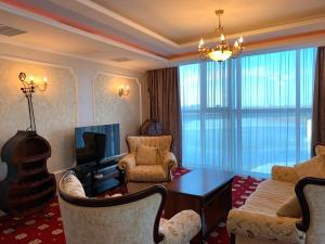 Zona de estar de Grand Hotel Astrakhan