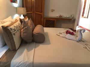 Postel nebo postele na pokoji v ubytování Hotel L'Ocean