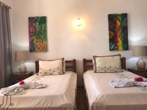 Postel nebo postele na pokoji v ubytování Hotel L'Ocean + 15 fotografií